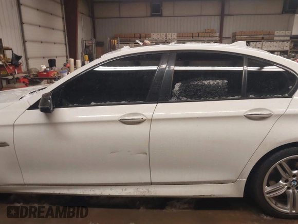 2014 BMW 5 Series 535i xDrive with VIN WBA5B3C53ED292653, listed as a IAAI auction lot 41568357 with 180,608 mi miles and . Bid and sale history available at carsss.com. Image 15.