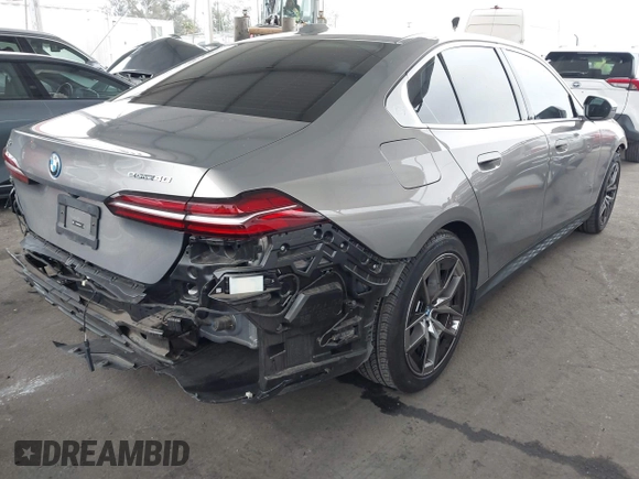 2024 BMW i5 eDrive40 with VIN WBY33FK06RCR97424, listed as a IAAI auction lot 42173284 with 18,645 mi miles and . Bid and sale history available at DreamBid. Image 4.