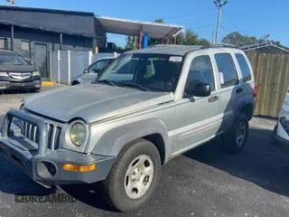 2002 Jeep Liberty Sport with VIN 1J4GL48K72W243074, listed as a Copart auction lot 80737354 with 127,177 mi miles and Clean Title. Bid and sale history available at carsss.com. Image 2.