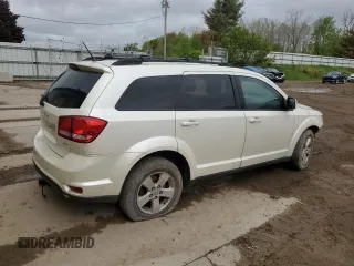 2012 Dodge Journey SXT with VIN 3C4PDCCG1CT349494, listed as a Copart auction lot 56019915 with 119,040 mi miles and Salvage title. Bid and sale history available at DreamBid. Image 3.