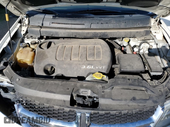 2012 Dodge Journey SXT z VIN 3C4PDCBG0CT364005, wystawiony jako Copart lot #55636265 z przebiegiem 150 048 mil mil oraz Szkoda całkowita • Salvage title. Historia ofert i sprzedaży dostępna na DreamBid. Obrazek 12.