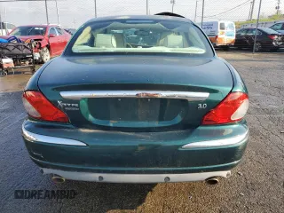 2007 Jaguar X-Type z VIN SAJWA51A17WJ20376, wystawiony jako Copart lot #52513655 z przebiegiem 162 104 mil mil oraz Tytuł czysty. Historia ofert i sprzedaży dostępna na DreamBid. Obrazek 6.