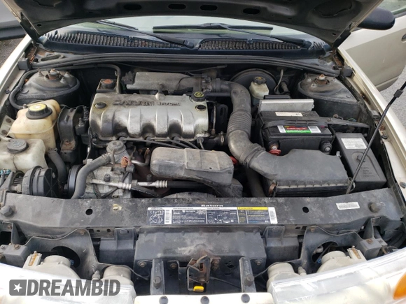2001 Saturn SL z VIN 1G8ZH52851Z286886, wystawiony jako Copart lot #84883824 z przebiegiem Nie podano mil oraz Szkoda całkowita • Salvage title. Historia ofert i sprzedaży dostępna na DreamBid. Obrazek 11.