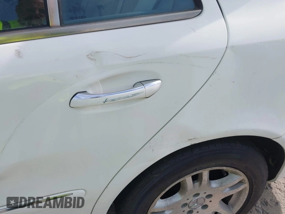 2003 Mercedes-Benz E 320 with VIN WDBUF65J63A263949, listed as a IAAI auction lot 42020627 with Not Provided miles and . Bid and sale history available at DreamBid. Image 13.