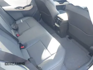 2024 Lexus RZ 300e Premium z VIN JTJABABB3RA002882, wystawiony jako IAAI lot #41262906 z przebiegiem 8 114 mil mil oraz . Historia ofert i sprzedaży dostępna na DreamBid. Obrazek 8.