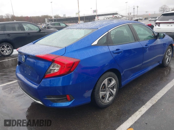 2019 Honda Civic LX with VIN 2HGFC2F64KH579860, listed as a IAAI auction lot 42026395 with 49,834 mi miles and . Bid and sale history available at DreamBid. Image 4.