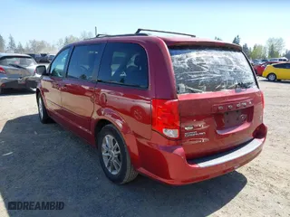 2015 Dodge Grand Caravan SXT with VIN 2C4RDGCG9FR632068, listed as a IAAI auction lot 42032317 with 127,075 mi miles. Bid and sale history available at carsss.com. Image 3.
