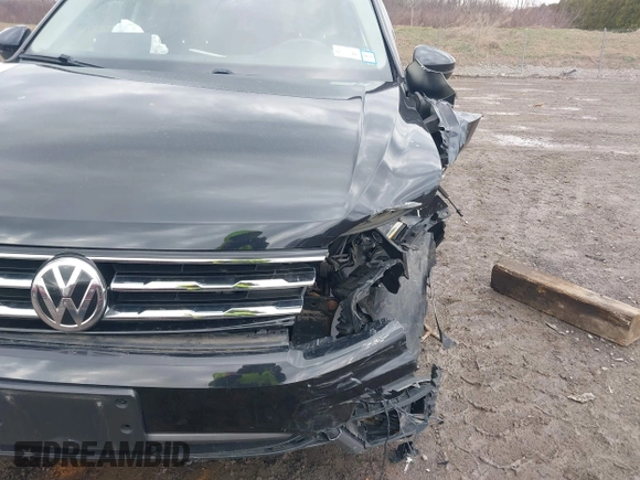 2019 Volkswagen Tiguan S with VIN 3VV0B7AX0KM046024, listed as a IAAI auction lot 41924867 with 126,729 mi miles and . Bid and sale history available at DreamBid. Image 6.