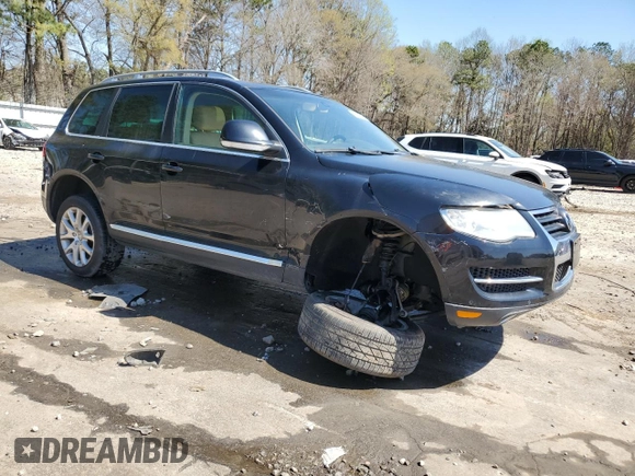2010 Volkswagen Touareg VR6 with VIN WVGBF7A97AD003738, listed as a Copart auction lot 50394915 with 126,591 mi miles and Salvage Title. Bid and sale history available at DreamBid. Image 4.
