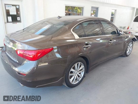 2015 Infiniti Q50 Premium with VIN JN1BV7AP4FM330386, listed as a IAAI auction lot 42028771 with 75,533 mi miles. Bid and sale history available at carsss.com. Image 4.