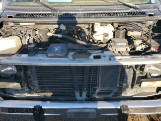1995 GMC Vandura z VIN 1GDEG25K2SF543904, wystawiony jako Copart lot #68934904 z przebiegiem 949 271 mil mil oraz Szkody całkowita. Historia ofert i sprzedaży dostępna na DreamBid. Obrazek 12.