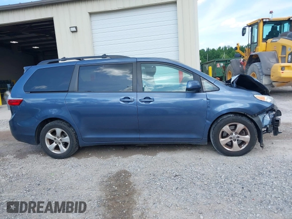 2015 Toyota Sienna LE AAS with VIN 5TDKK3DCXFS624984, listed as a IAAI auction lot 42560632 with 169,034 mi miles and . Bid and sale history available at DreamBid. Image 14.