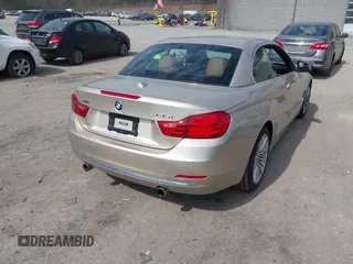 2015 BMW 4 Series 435i xDrive with VIN WBA3T7C51FP942320, listed as a IAAI auction lot 42059717 with 81,815 mi miles and . Bid and sale history available at DreamBid. Image 4.