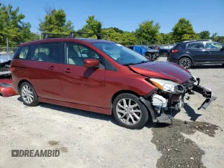 2012 Mazda 5 Grand Touring with VIN JM1CW2DL0C0139724, listed as a Copart auction lot 70640054 with 92,129 mi miles and Salvage Title. Bid and sale history available at DreamBid. Image 4.