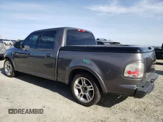2002 Ford F-150 Harley Davidson with VIN 1FTRW07342KC78218, listed as a Copart auction lot 78273304 with 217,968 mi miles and Salvage Title. Bid and sale history available at carsss.com. Image 2.