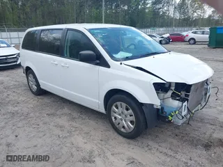 2018 Dodge Grand Caravan SE Plus with VIN 2C4RDGBGXJR163986, listed as a IAAI auction lot 41933618 with 98,297 mi miles. Bid and sale history available at carsss.com. Image 1.