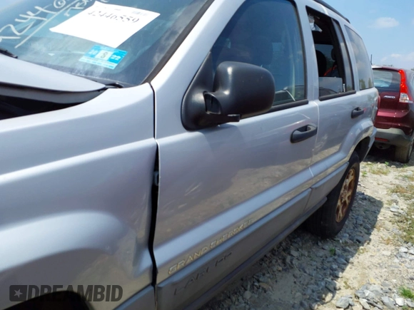 2002 Jeep Grand Cherokee Laredo with VIN 1J4GW48SX2C313093, listed as a IAAI auction lot 42446559 with 200,319 mi miles and . Bid and sale history available at DreamBid. Image 17.