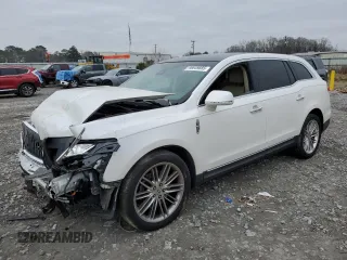 2014 Lincoln MKT EcoBoost with VIN 2LMHJ5ATXEBL50487, listed as a Copart auction lot 46649885 with 187,261 mi miles and Salvage Title. Bid and sale history available at DreamBid. Image 1.