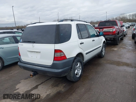 1999 Mercedes-Benz M 320/430/500 with VIN 4JGAB54E3XA141663, listed as a IAAI auction lot 41886982 with 196,503 mi miles and . Bid and sale history available at DreamBid. Image 4.