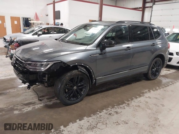 2022 Volkswagen Tiguan SE R-Line Black with VIN 3VV8B7AX9NM103988, listed as a IAAI auction lot 41908814 with 43,671 mi miles and . Bid and sale history available at DreamBid. Image 2.