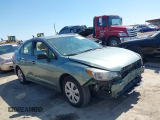 2016 Subaru Impreza z VIN JF1GJAA62GH019087, wystawiony jako IAAI lot #41987344 z przebiegiem 81 782 mil mil oraz . Historia ofert i sprzedaży dostępna na DreamBid. Obrazek 13.