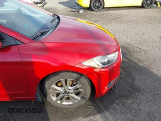 2018 Hyundai Elantra SEL z VIN 5NPD84LF1JH256573, wystawiony jako IAAI lot #41637578 z przebiegiem 95 863 mil mil oraz . Historia ofert i sprzedaży dostępna na DreamBid. Obrazek 12.