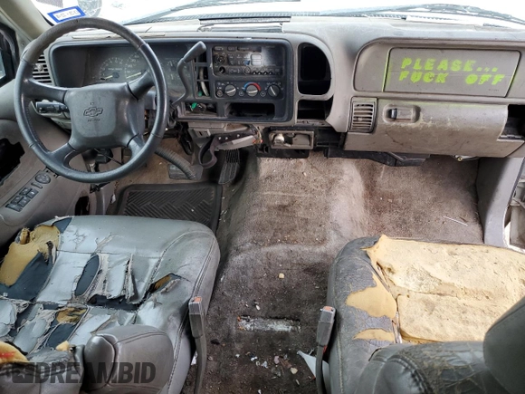 1999 Chevrolet Suburban with VIN 1GNEC16R7XJ418169, listed as a Copart auction lot 88995495 with 2,015,240 mi miles and Salvage title. Bid and sale history available at DreamBid. Image 8.