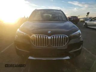2022 BMW X1 sDrive28i with VIN WBXJG7C07N5U58359, listed as a Copart auction lot 86908624 with 34,557 mi miles and Salvage Title. Bid and sale history available at carsss.com. Image 5.
