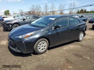 2021 Toyota Prius L Eco with VIN JTDKAMFU6M3150108, listed as a Copart auction lot 53690385 with 105,765 mi miles and Salvage Title. Bid and sale history available at carsss.com. Image 1.