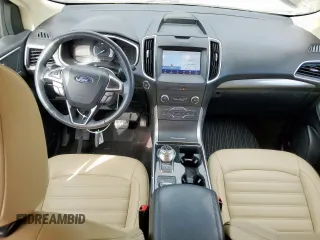 2020 Ford Edge SEL с VIN 2FMPK3J93LBB16928, выставлен на аукционе Copart как лот 63030385 с пробегом 81 567 миль миль и Чистый • Clean title. История ставок и продаж доступна на DreamBid. Изображение 8.