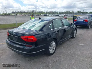 2016 Volkswagen Passat 1.8T SE w/Technology with VIN 1VWBS7A35GC047180, listed as a IAAI auction lot 41650618 with 42,491 mi miles. Bid and sale history available at carsss.com. Image 4.