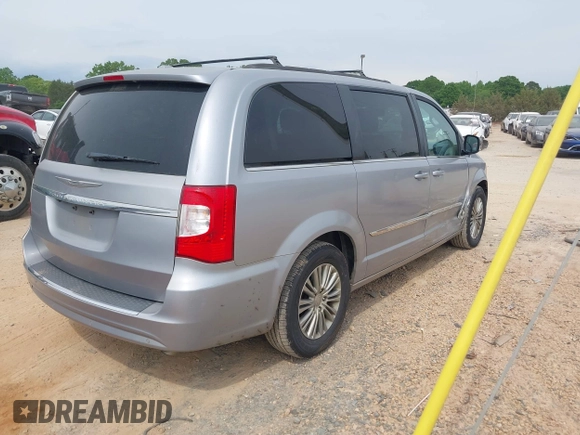 2014 Chrysler Town & Country Touring L with VIN 2C4RC1CG9ER376058, listed as a IAAI auction lot 42099348 with 186,226 mi miles and . Bid and sale history available at DreamBid. Image 4.