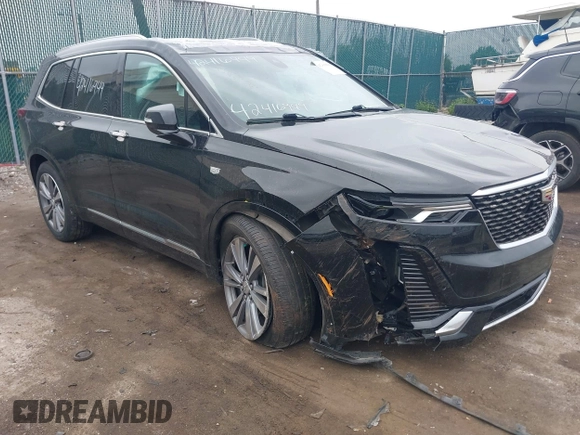 2020 Cadillac XT6 FWD Premium Luxury z VIN 1GYKPCRS6LZ148058, wystawiony jako IAAI lot #42416949 z przebiegiem 79 318 mil mil oraz . Historia ofert i sprzedaży dostępna na DreamBid. Obrazek 1.