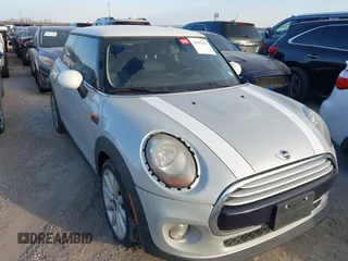 2014 MINI Hardtop with VIN WMWXM5C57ET933095, listed as a IAAI auction lot 41592459 with 102,949 mi miles and . Bid and sale history available at DreamBid. Image 1.