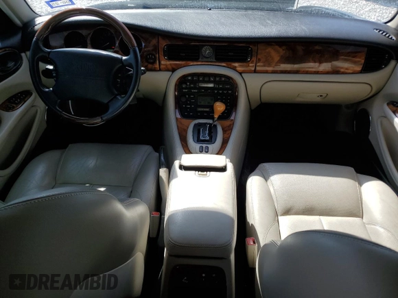 2002 Jaguar XJ with VIN SAJDA15BX2MF47193, listed as a Copart auction lot 49065275 with 69,544 mi miles and Salvage title. Bid and sale history available at DreamBid. Image 8.