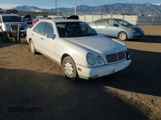 1999 Mercedes-Benz E-Class with VIN WDBJF82H1XX024280, listed as a Copart auction lot 83213204 with 212,712 mi miles and Salvage Title. Bid and sale history available at carsss.com. Image 10.