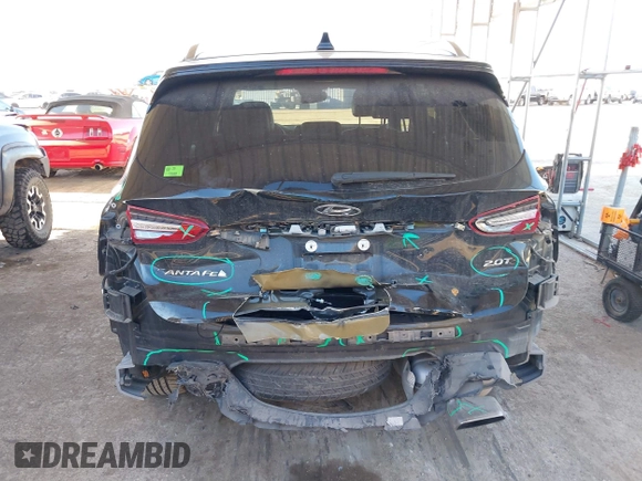 2019 Hyundai Santa Fe Ultimate with VIN 5NMS53AA3KH039879, listed as a IAAI auction lot 41223704 with 71,169 mi miles. Bid and sale history available at carsss.com. Image 16.