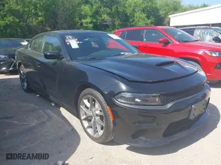 2023 Dodge Charger GT with VIN 2C3CDXHG8PH579373, listed as a IAAI auction lot 42001295 with 57,006 mi miles. Bid and sale history available at carsss.com. Image 1.