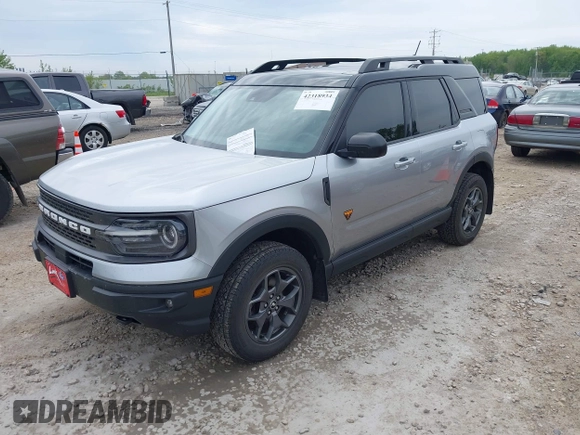 2021 Ford Bronco Sport Badlands z VIN 3FMCR9D99MRA67830, wystawiony jako IAAI lot #42318934 z przebiegiem 129 598 mil mil oraz . Historia ofert i sprzedaży dostępna na DreamBid. Obrazek 2.