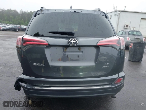 2018 Toyota RAV4 LE with VIN 2T3BFREV8JW850391, listed as a IAAI auction lot 42487413 with 66,866 mi miles and . Bid and sale history available at DreamBid. Image 16.