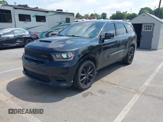 2015 Dodge Durango Limited with VIN 1C4RDJDG0FC188597, listed as a IAAI auction lot 42643498 with 117,729 mi miles and . Bid and sale history available at DreamBid. Image 2.