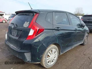 2015 Honda Fit LX with VIN 3HGGK5H50FM768011, listed as a IAAI auction lot 41499374 with 142,211 mi miles and . Bid and sale history available at DreamBid. Image 4.