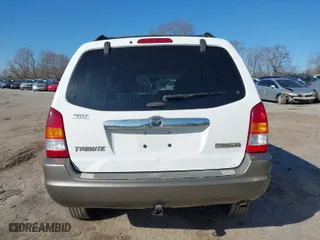 2003 Mazda Tribute ES with VIN 4F2CZ96113KM54743, listed as a IAAI auction lot 41640604 with 171,648 mi miles. Bid and sale history available at carsss.com. Image 12.