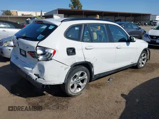 2013 BMW X1 28i with VIN WBAVM1C52DVW45195, listed as a IAAI auction lot 41964903 with 1 mi miles. Bid and sale history available at carsss.com. Image 4.