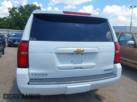 2020 Chevrolet Tahoe LTZ with VIN 1GNSCCKCXLR215899, listed as a IAAI auction lot 40128171 with 109,541 mi miles and . Bid and sale history available at DreamBid. Image 16.