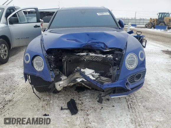 2017 Bentley Bentayga W12 z VIN SJAAC2ZV2HC014080, wystawiony jako Copart lot #44806115 z przebiegiem 63 077 mil mil oraz Szkody całkowita. Historia ofert i sprzedaży dostępna na DreamBid. Obrazek 5.