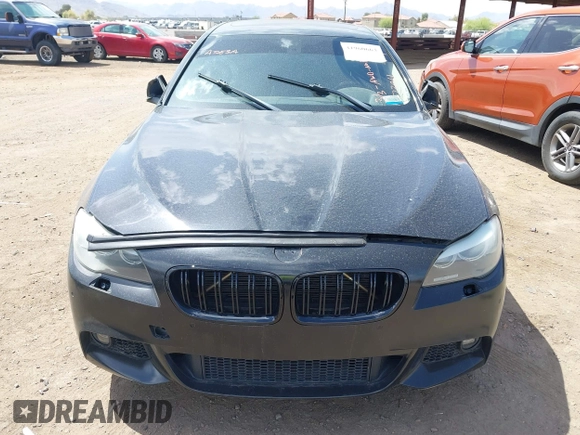 2013 BMW 5 Series 535i xDrive with VIN WBAFU7C51DDU73061, listed as a IAAI auction lot 41960663 with 106,591 mi miles and . Bid and sale history available at carsss.com. Image 6.