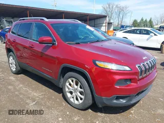 2015 Jeep Cherokee Latitude with VIN 1C4PJLCS2FW537288, listed as a IAAI auction lot 41957719 with 139,008 mi miles. Bid and sale history available at carsss.com. Image 1.