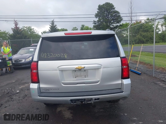 2015 Chevrolet Suburban LT z VIN 1GNSCJKC2FR144528, wystawiony jako IAAI lot #42320028 z przebiegiem 226 076 mil mil oraz . Historia ofert i sprzedaży dostępna na DreamBid. Obrazek 16.