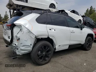 2024 Toyota RAV4 Hybrid XSE with VIN 4T3E6RFV0RU141591, listed as a Copart auction lot 59623085 with 27,682 mi miles and Salvage title. Bid and sale history available at DreamBid. Image 3.